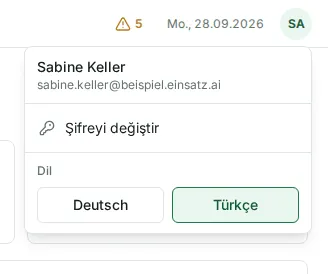 Açık profil menüsü: ad, e-posta adresi, “Şifreyi değiştir” ve “Dil”
